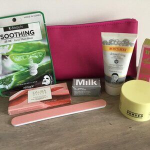 Pink Cosmetic Bag with Zipper Closure Filled with 7 Assorted Beauty Items